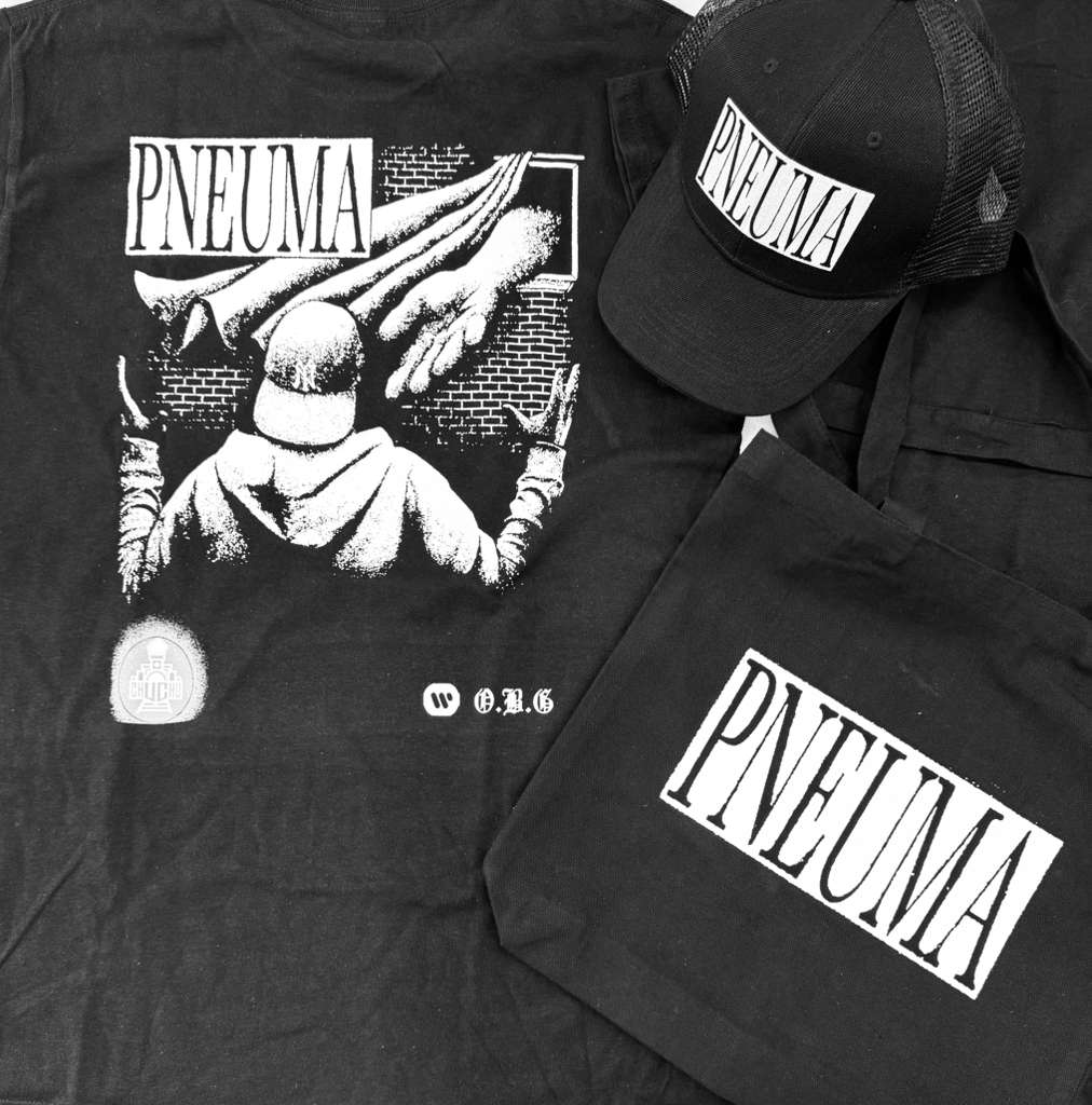 Black t-shirt with graphic design and 'Pneuma' branding, accompanied by a Black Cap w LogoBox Pneuma and Tote Bag w Logo Box Pneuma .
